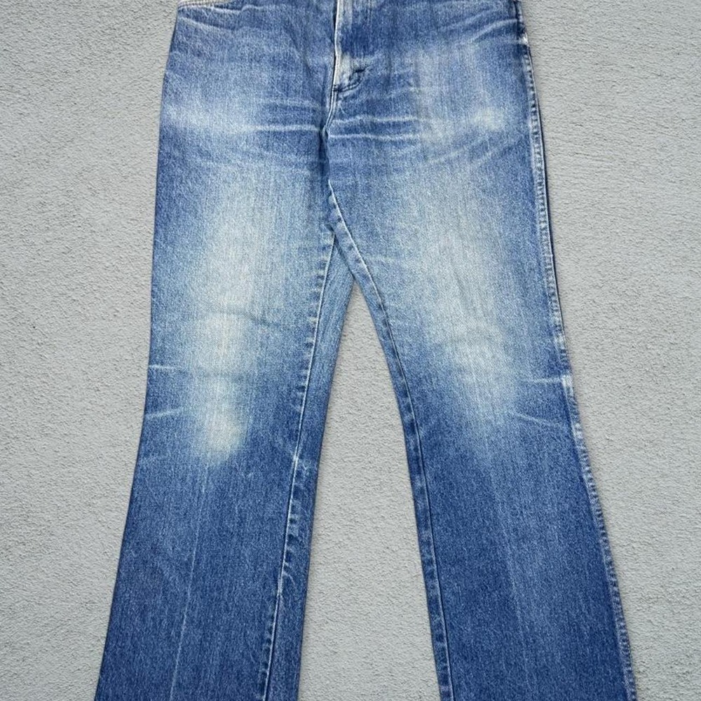 Vintage 90s Wrangler Rustler Mens Blue Jeans Straight Leg Made in USA 31x29